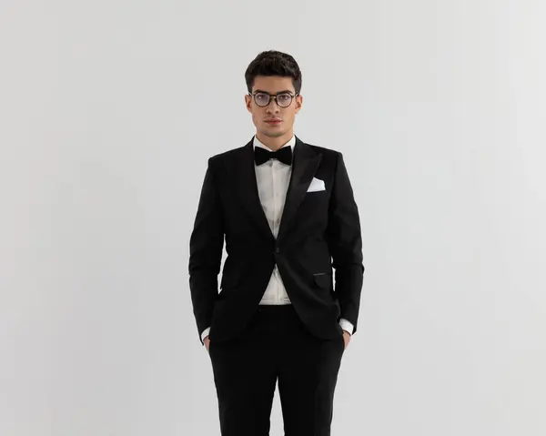 Closeup Relaxed Young Man Black Suit Standing Hands Pockets While — Stock Photo, Image