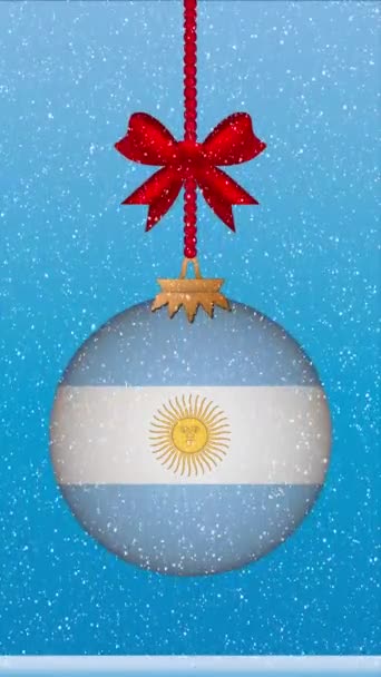 Snö Faller Julbollen Med Argentinas Flagga — Stockvideo