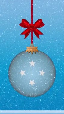 FS Micronesia bayrağıyla Noel balosunun üzerine kar yağıyor.