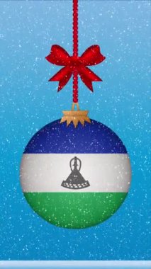 Lesoto bayrağıyla Noel balosuna kar yağıyor.