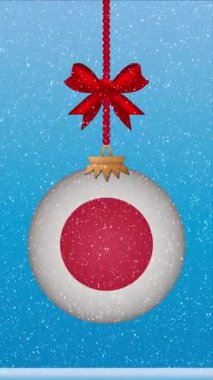 Japon bayrağıyla Noel balosuna kar yağıyor.