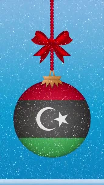 Neve Che Cade Sulla Palla Natale Con Bandiera Libia — Video Stock
