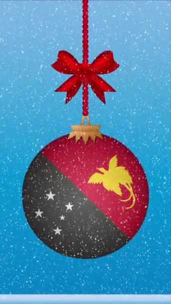 Χιόνι Πέφτει Χριστουγεννιάτικη Μπάλα Σημαία Της Παπούα Νέα Γουινέα — Αρχείο Βίντεο