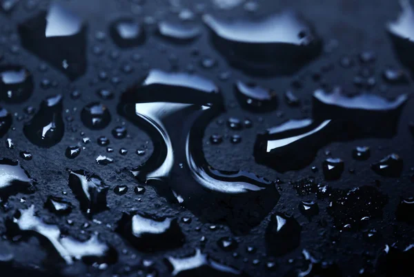 Капли Влажной Воды Черной Поверхности — стоковое фото