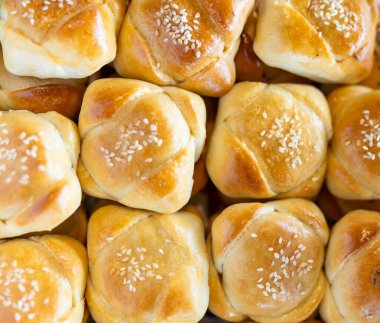 Plate full of freshly baked scones clipart