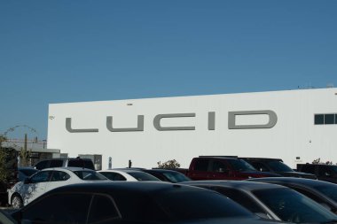 Casa Grande, Arizona, USA- June 30, 2023: The name on the new Lucid Motors electric vehicle manufacturing plant in Eloy, Arizona is shown from the employee parking lot.