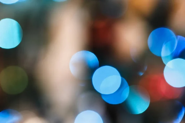 Blaue Und Goldene Weihnachtsgirlanden Bokeh Lichter Auf Einem Baum Abstrakte lizenzfreie Stockfotos