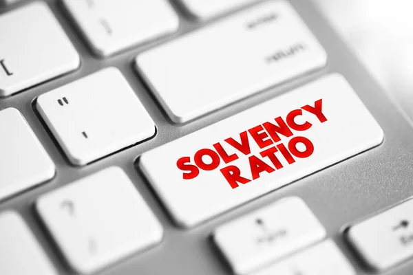 stock image Solvency Ratio - relationship between equity and total assets, text concept button on keyboard