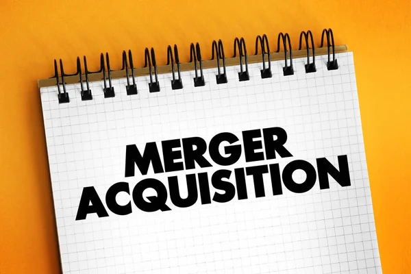 Merger Acquisition - involves the process of combining two companies into one, text concept on notepad