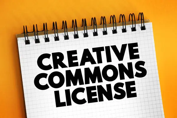 Creative Commons license - one of several public copyright licenses that enable the free distribution of an otherwise copyrighted work, text concept on notepad