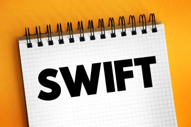 SWIFT mesajlaşma ağı küresel ödeme sisteminin bir bileşenidir, not defterindeki metin kavramı