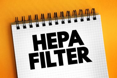 HEPA Filtresi - Yüksek verimli partikül emici filtre ve yüksek verimli partikül tutuklama filtresi, not defterinde metin konsepti