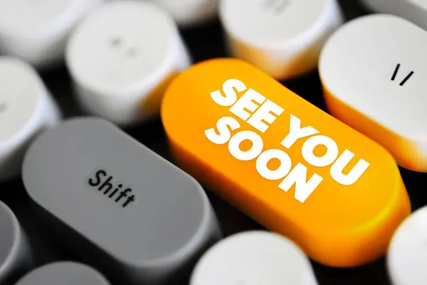 stock image See You Soon - way of saying goodbye, indicating that you expect to meet the person again in the near future, text concept button on keyboard