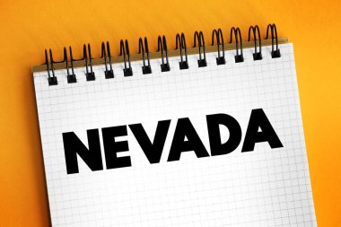 Nevada is a landlocked state in the Western region of the United States, text concept on notepad