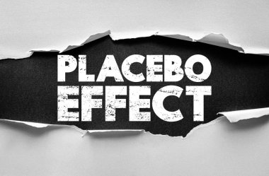 PLACEBO EFFECT metin kalın çatlak tarzı kağıt kesme arka plan. Psikoloji, tıp, araştırma, klinik çalışma ve algıyı temsil eder