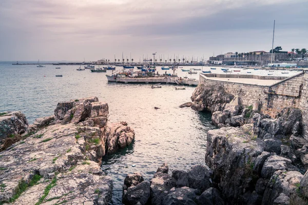 View of Atlantic coast in Cascais, Portugal with Naval Club and Citadel of Cascais