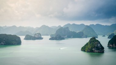 Beautiful limestone karst islands of Ha Long Bay in Vietnam. View from Ti-Top Island clipart