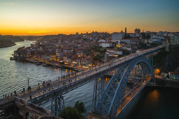 stock image Dom Luiz bridge over river douro at porto in portugal at night