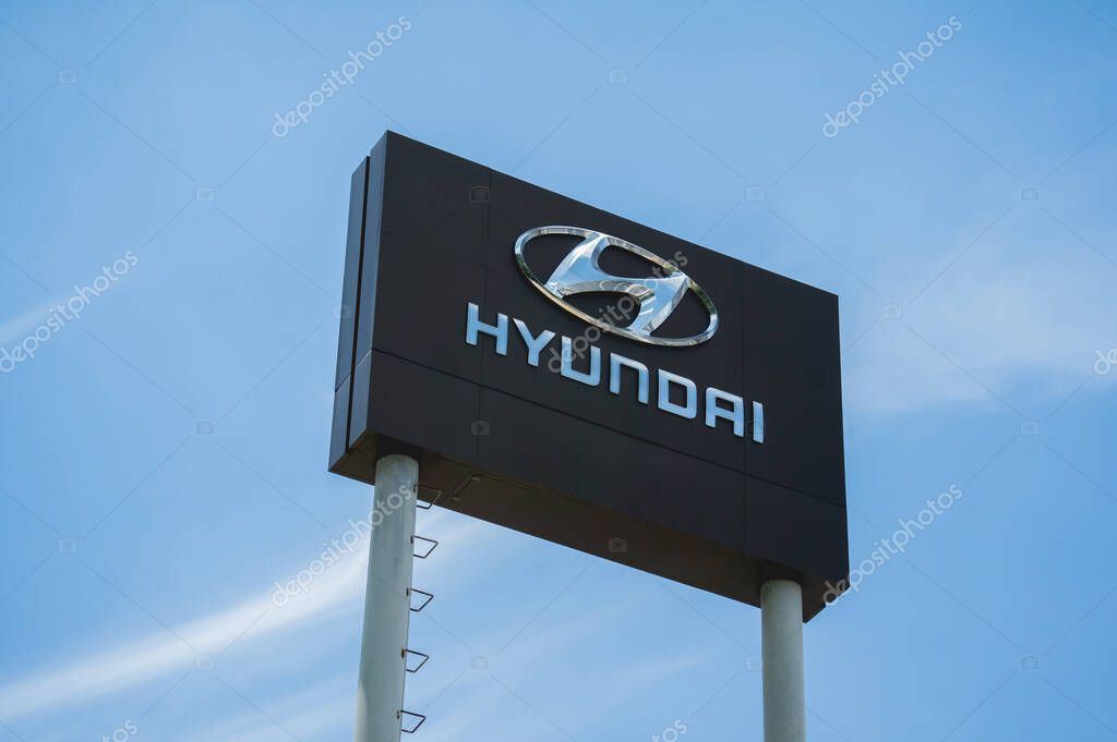 PHUKET, THAILAND - AUGUST 09, 2022: Signboard with logo of Hyundai Corporation against blue sky.
