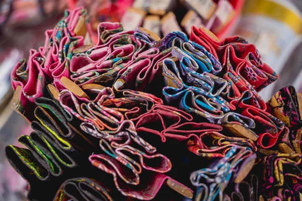 stock image Old carpets rolled up rugs shop store.