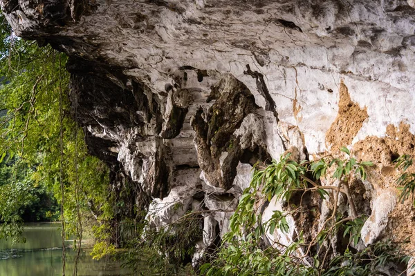 stock image Big dark stone cave inside near entrance.