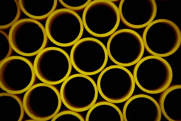 Background Green Plastic Pipes Stacked — Stock Photo, Image