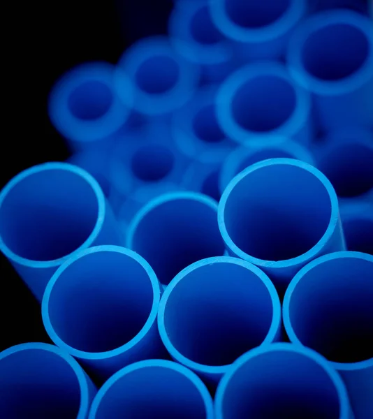 Hintergrund Der Blauen Kunststoffrohre Gestapelten — Stockfoto