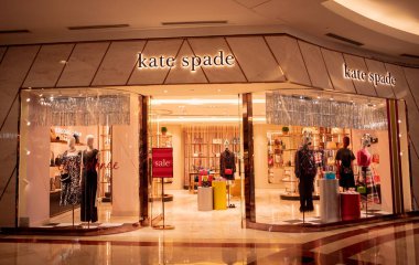 KUALA LUMPUR, MALAYSIA - DECEMBER 04, 2022: Kate Spades brand retail shop logo signboard on the storefront in the shopping mall.