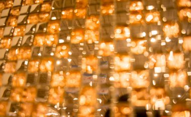 Bloored background of colorful samples of a ceramic tile.