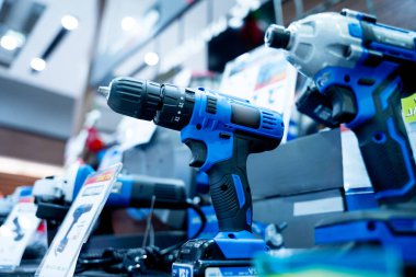 Construction carpentry electric cordless drill at the showroom of a large store