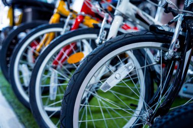 Row of bicycle wheels at the special bicycle shop.
