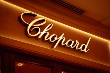 KUALA LUMPUR, MALAYSIA - DECEMBER 04, 2022: Chopard brand retail shop logo signboard on the storefront in the shopping mall.
