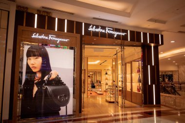 KUALA LUMPUR, MALAYSIA - DECEMBER 04, 2022: Salvatore Ferragamo brand retail shop logo signboard on the storefront in the shopping mall.