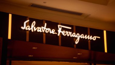 KUALA LUMPUR, MALAYSIA - DECEMBER 04, 2022: Salvatore Ferragamo brand retail shop logo signboard on the storefront in the shopping mall.