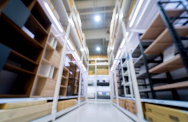Blurred background of large household appliances and furniture store.