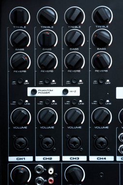 Rear view of speaker amplifier and equalizer at music studio.