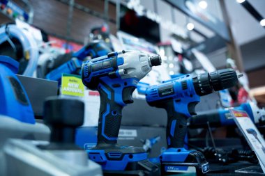 Construction carpentry electric cordless drill at the showroom of a large store