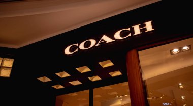 KUALA LUMPUR, MALAYSIA - DECEMBER 04, 2022: Coach brand retail shop logo signboard on the storefront in the shopping mall.