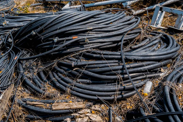 Old and dirty phone cables at the city landfill.