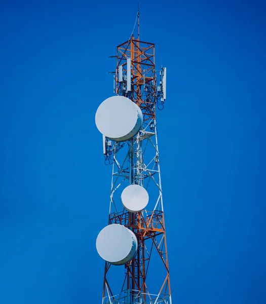 5G Cell Towers for smart mobile telephone on sky background.