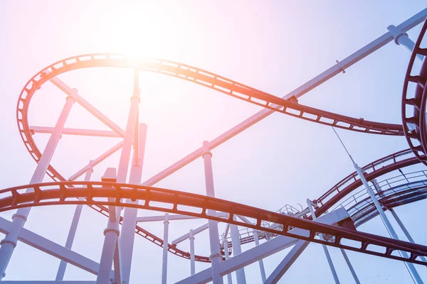 Large roller coaster details on the light background.