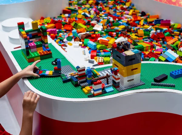 stock image View on multi color plastic bricks at the table