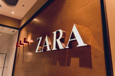 WARSAW. POLAND - MAY 21, 2023: Zara brand retail shop logo signboard on the storefront in the shopping mall. clipart