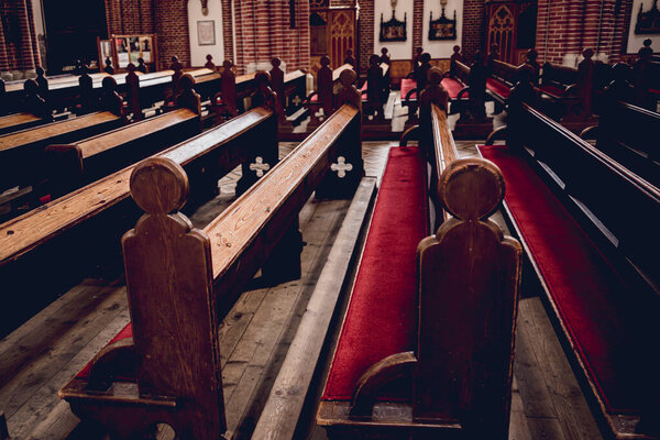Rows of church benches at the old european catholic church