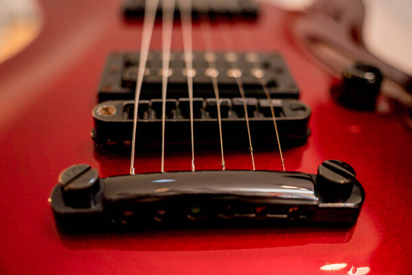 Electric guitar red color in the music shop.