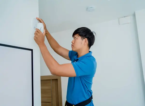 Technician Installing Motion Sensor Detector Modern Apartment — Stock Photo, Image