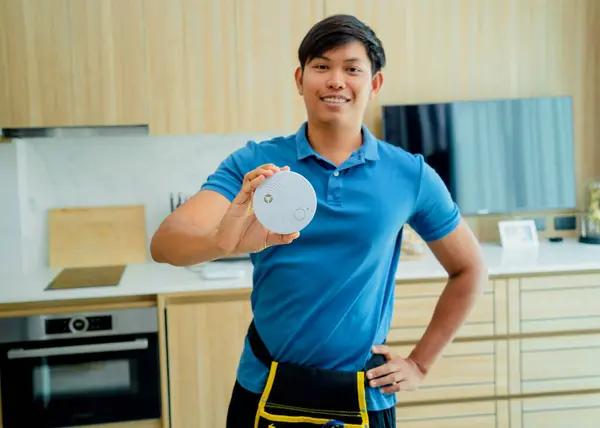 Technician Installing Fire Safety Detector Modern Apartment — Stock Photo, Image