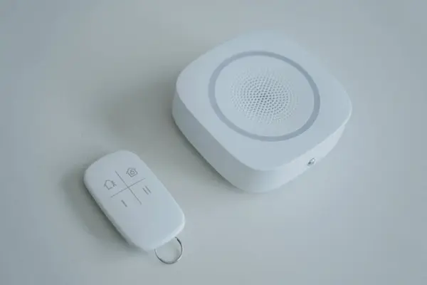 Security alarm siren on the table in a modern apartment