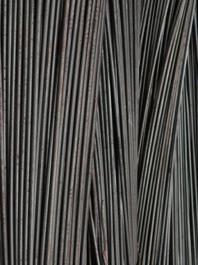 İnşaat deposundaki metal barların arka planı..