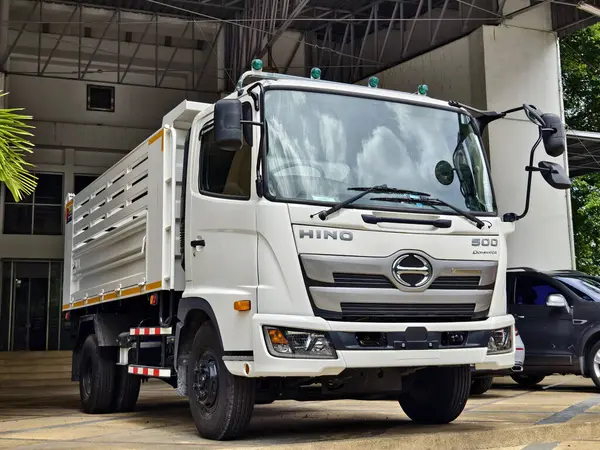 stock image PHUKET, THAILAND- June 01, 2024: White Hino lorry truck outside near showroom.